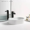 Shop 2025 the latest flute-designed Matte White Oval Above Counter Basin from Infinity Plus Bathrooms. Best Price Guarantee.