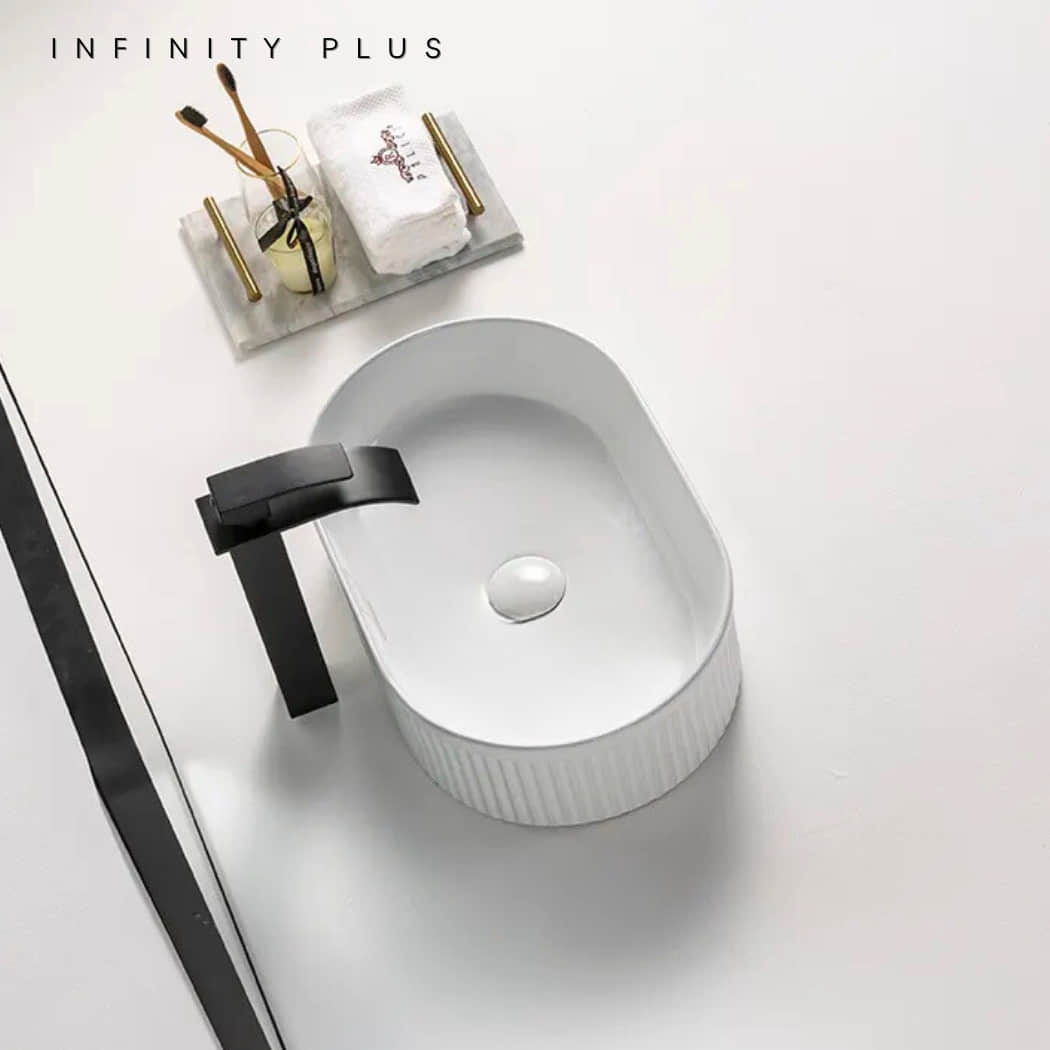 Shop 2025 the latest flute-designed Matte White Oval Above Counter Basin from Infinity Plus Bathrooms. Best Price Guarantee.